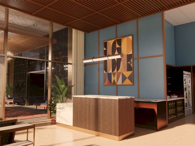 Modern office/lobby with a reception desk, blue walls, framed abstract art, and large windows with plants and couches.